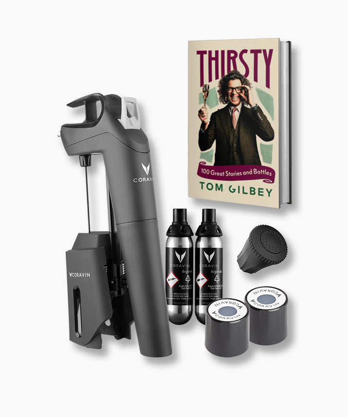 Corkage tool set with bottles and a book titled 'Thirsty' by Tom Gilbey on a white background